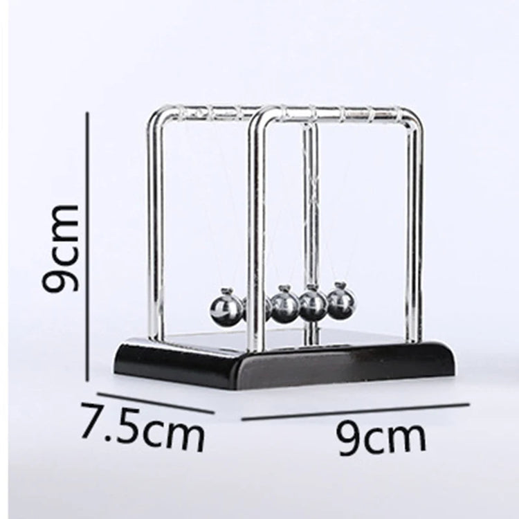 Science-themed home decor with mini Newton balance balls