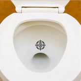 Set of 3 potty training target stickers featuring fun designs to encourage boys