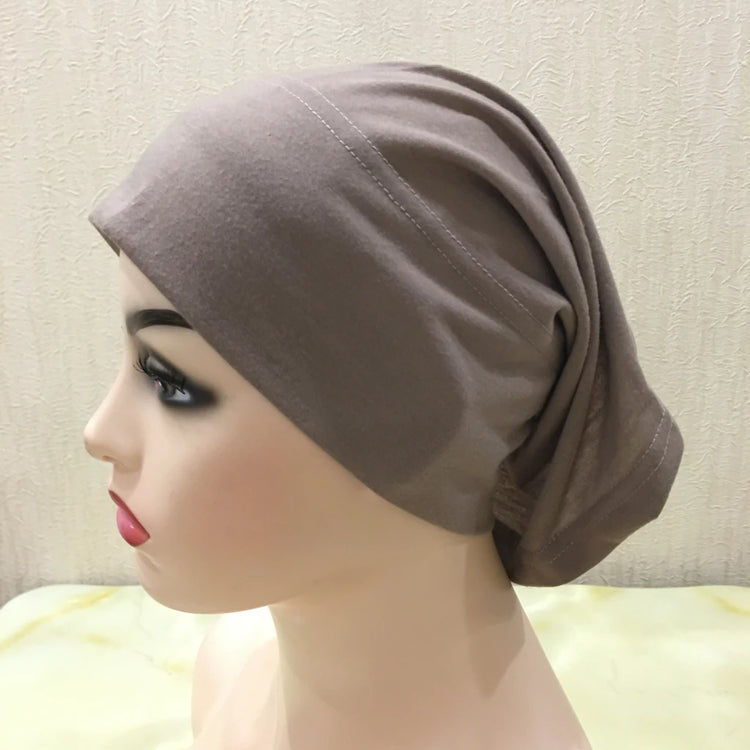 Lightweight spandex turban bonnet in beige, styled under a chiffon hijab