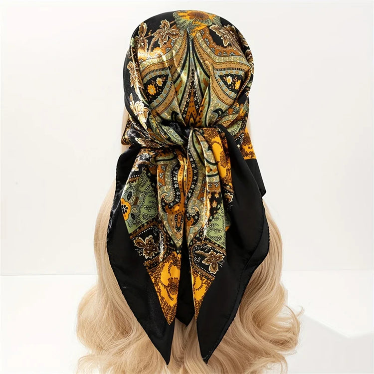 Elegant paisley print scarf styled as a fashionable necktie or handbag accessory