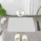 Absorbent stone bath mat with diatom mud material