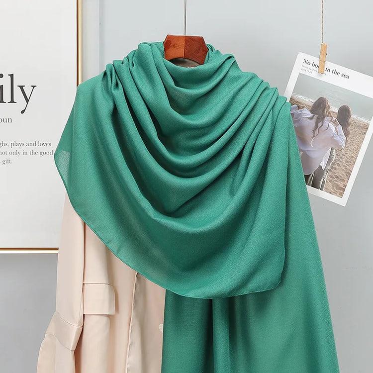 Elegant striped shawl wrap with tassel ends, suitable for casual and formal wear
