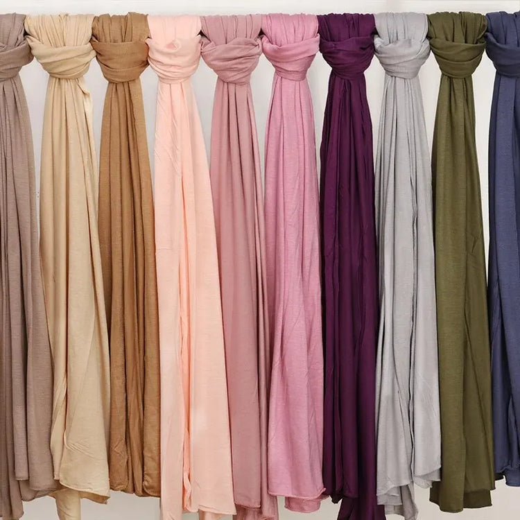 Soft plain cotton headscarf for women, used as a hijab or stylish headband wrap