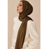 Long Muslim shawl made of modal cotton jersey fabric, wrapped elegantly around the head and ne