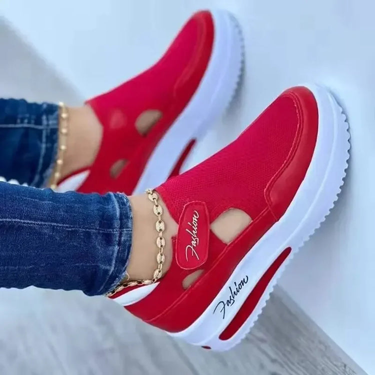 Women’s walking shoes with elevated platform sole and breathable mesh material