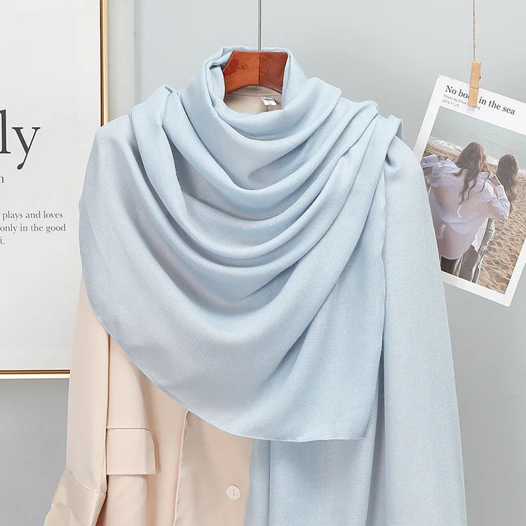 Elegant striped shawl wrap with tassel ends, suitable for casual and formal wear