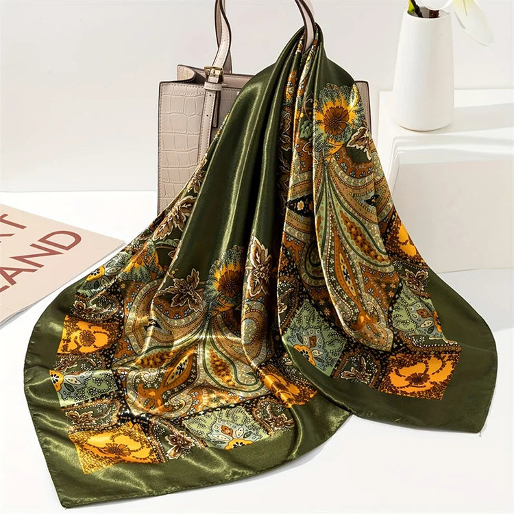 Elegant paisley print scarf styled as a fashionable necktie or handbag accessory