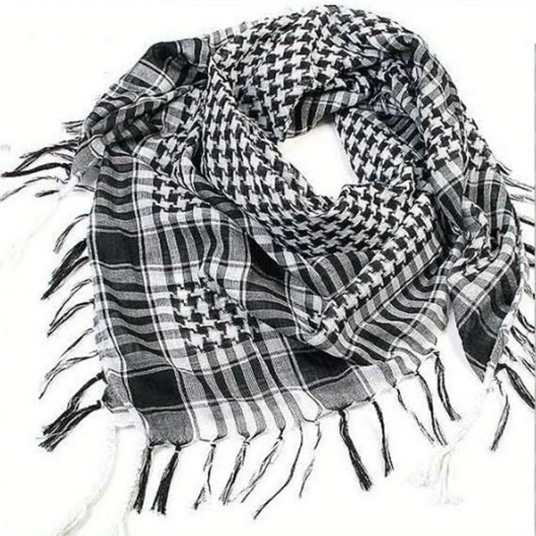 Arab shemagh scarf with traditional houndstooth pattern, styled as a face and neck wrap for sun protection
