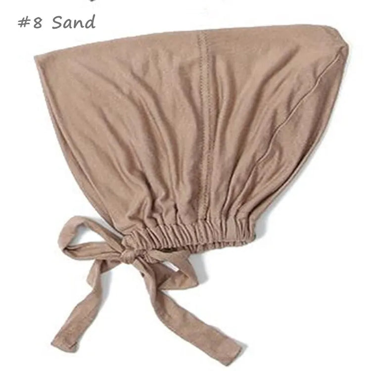 Soft elastic modal underscarf in beige, providing comfortable fit under hijabs for Muslim women