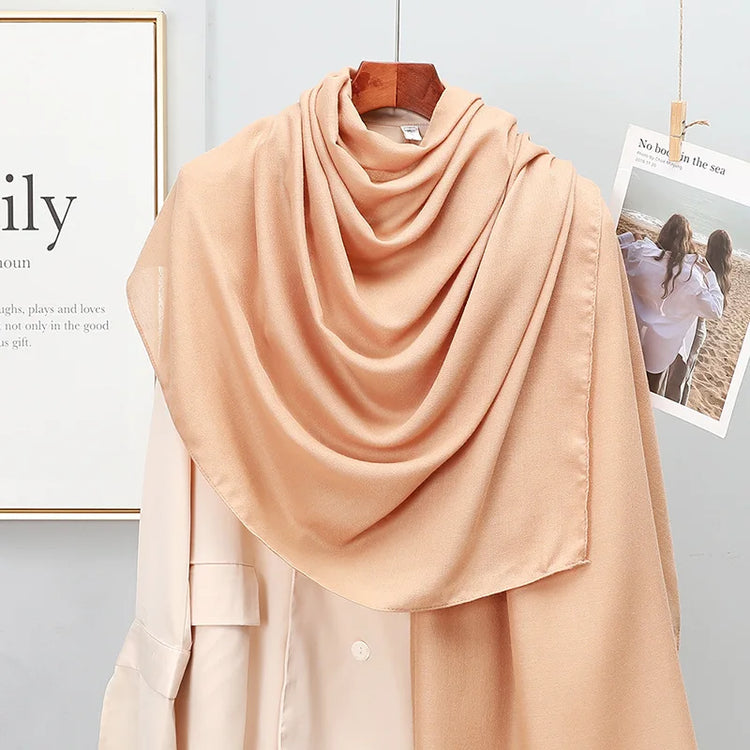 Elegant striped shawl wrap with tassel ends, suitable for casual and formal wear