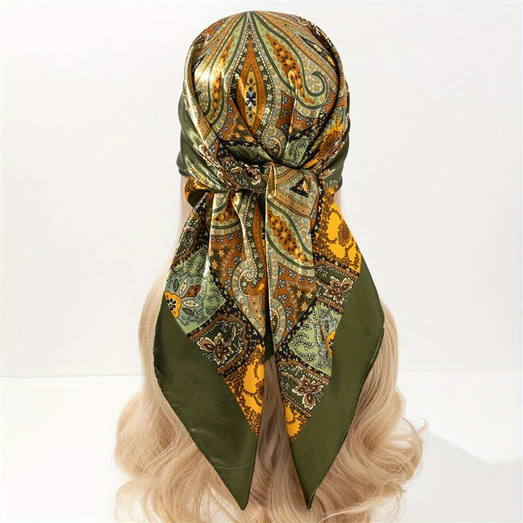 Elegant paisley print scarf styled as a fashionable necktie or handbag accessory