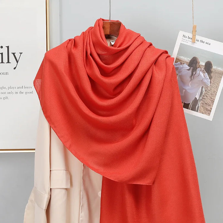Elegant striped shawl wrap with tassel ends, suitable for casual and formal wear