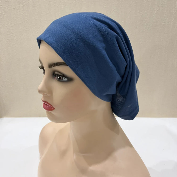 Lightweight spandex turban bonnet in beige, styled under a chiffon hijab
