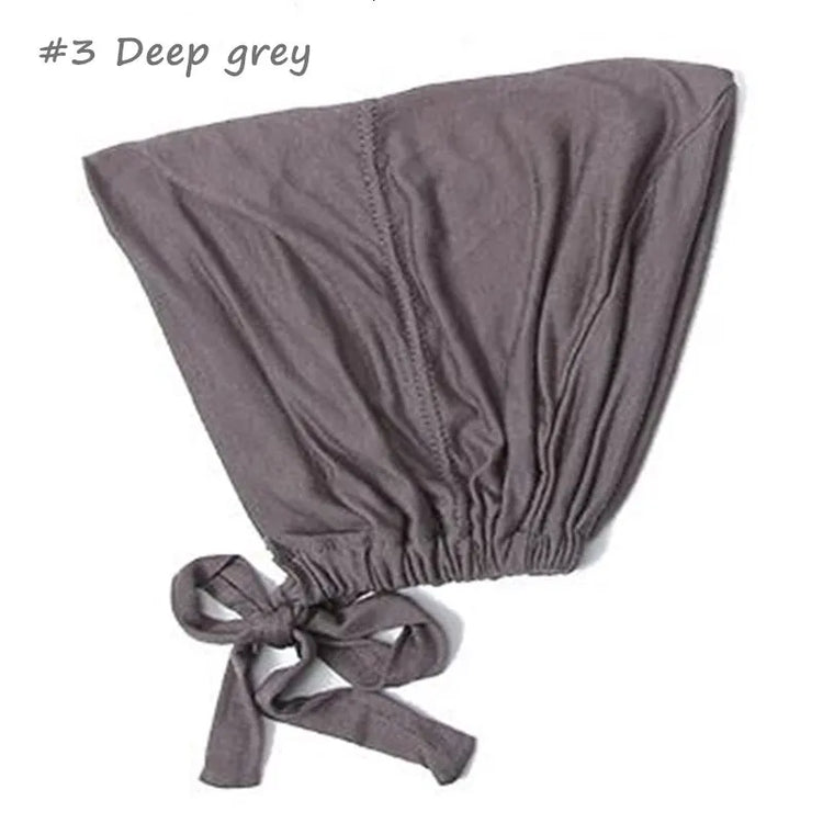 Soft elastic modal underscarf in beige, providing comfortable fit under hijabs for Muslim women