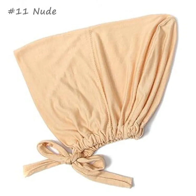 Soft elastic modal underscarf in beige, providing comfortable fit under hijabs for Muslim women