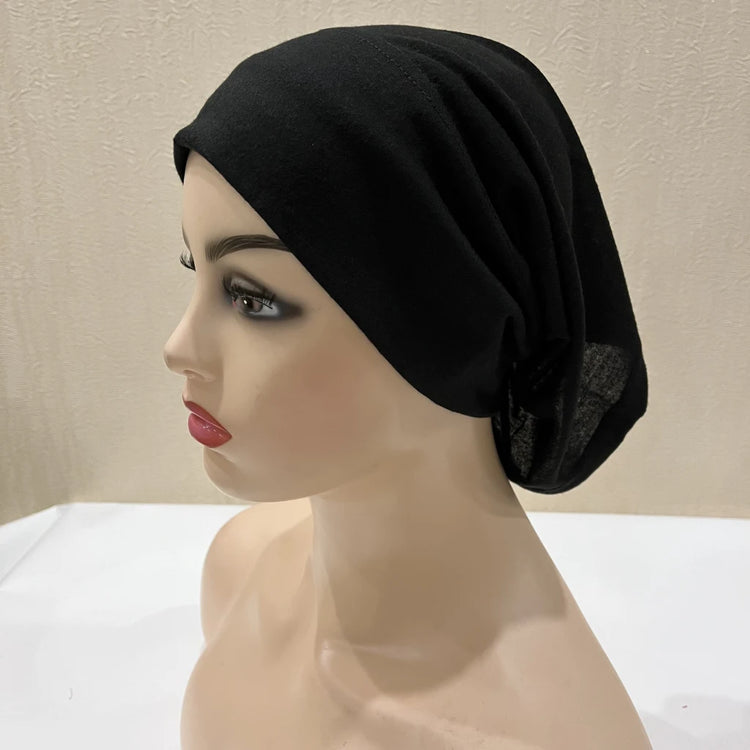 Lightweight spandex turban bonnet in beige, styled under a chiffon hijab