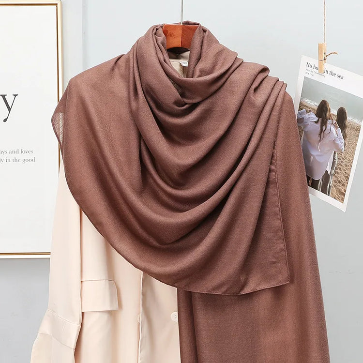 Elegant striped shawl wrap with tassel ends, suitable for casual and formal wear