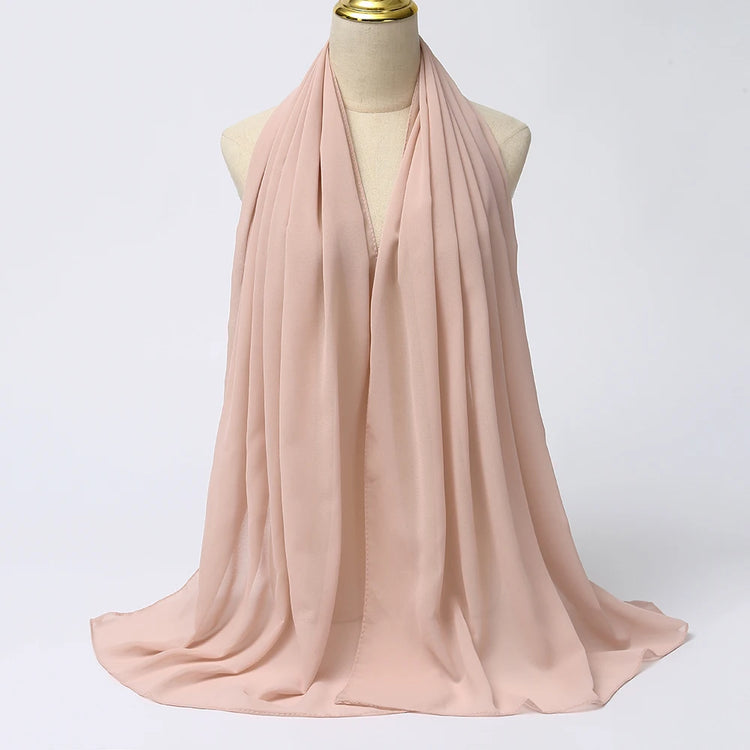 Lightweight voile headscarf in soft pastel tones, ideal for Muslim women&