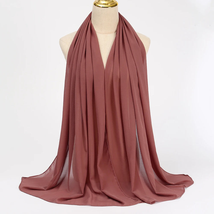 Lightweight voile headscarf in soft pastel tones, ideal for Muslim women&