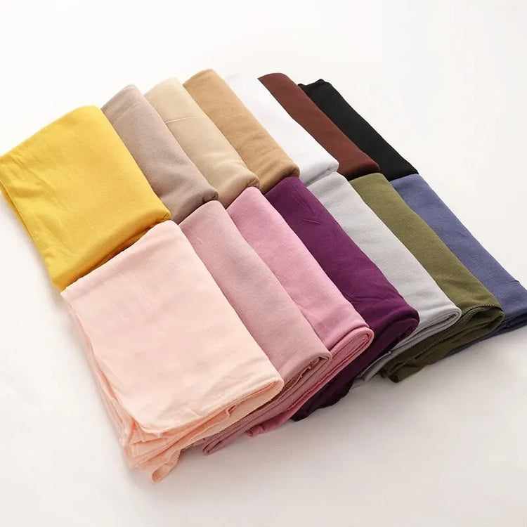 Soft plain cotton headscarf for women, used as a hijab or stylish headband wrap