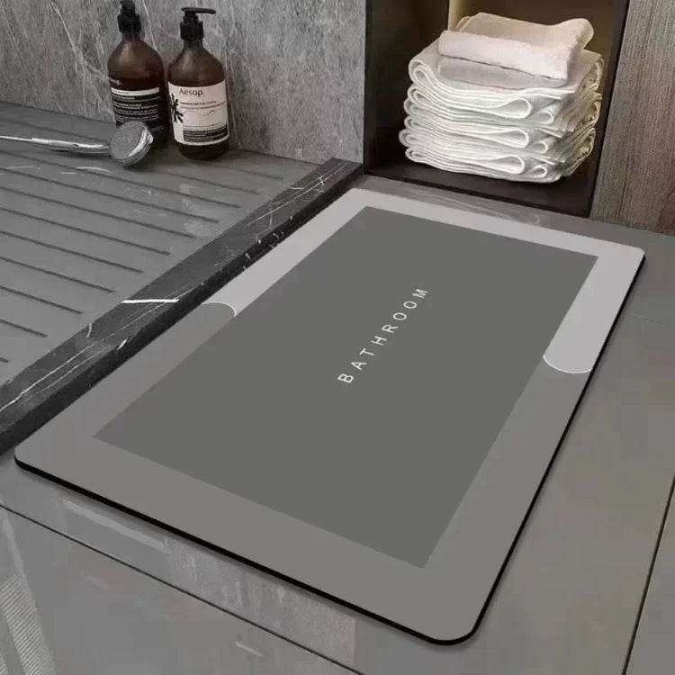 Water-absorbing bath mat with anti-skid backing
