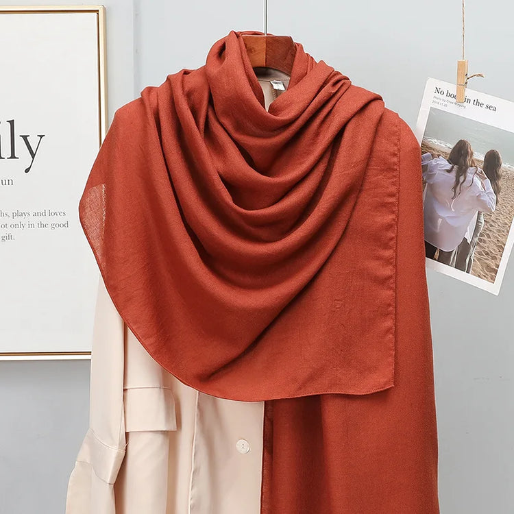 Elegant striped shawl wrap with tassel ends, suitable for casual and formal wear