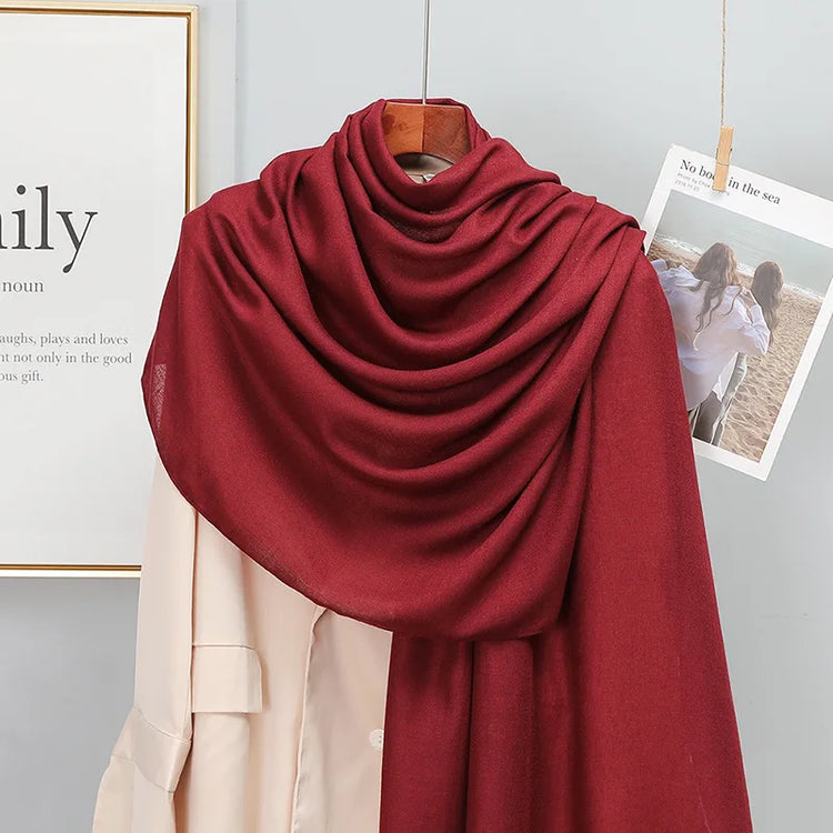 Elegant striped shawl wrap with tassel ends, suitable for casual and formal wear