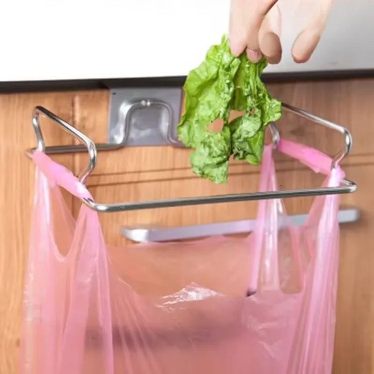 Space-saving kitchen trash rack for cabinet door garbage bag organization