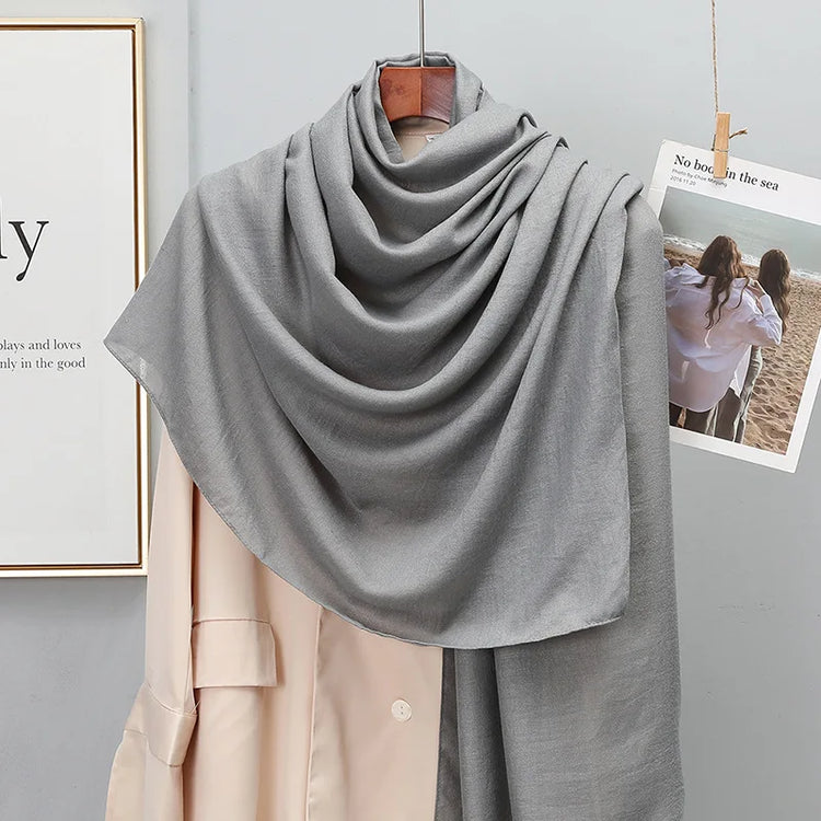 Elegant striped shawl wrap with tassel ends, suitable for casual and formal wear