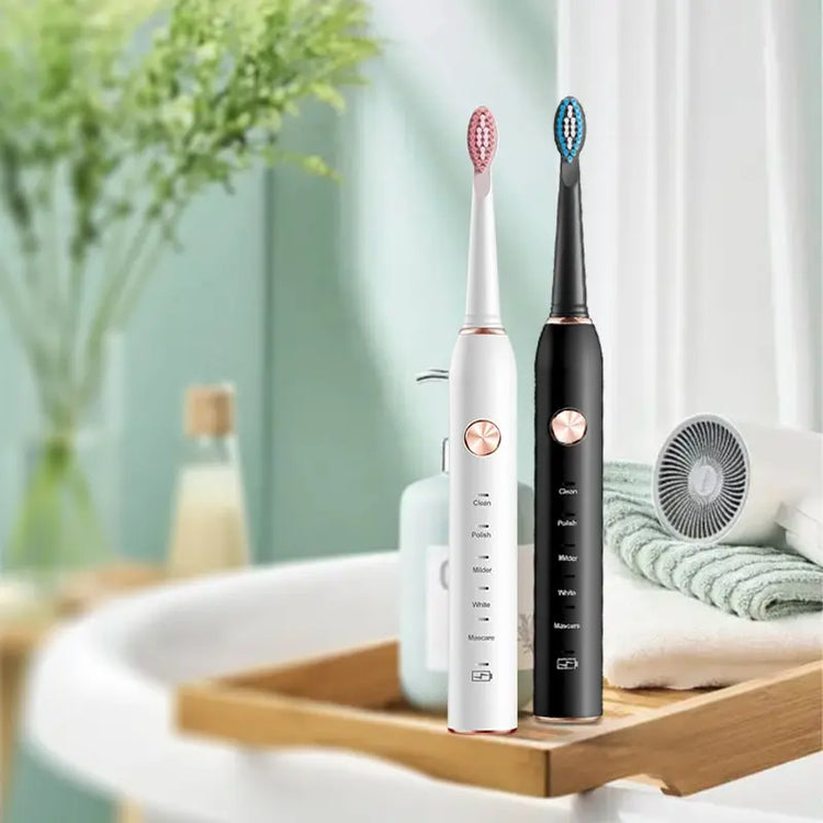 IPX7 waterproof Jianpai electric toothbrushes in black and white with ergonomic design and replaceable brush heads