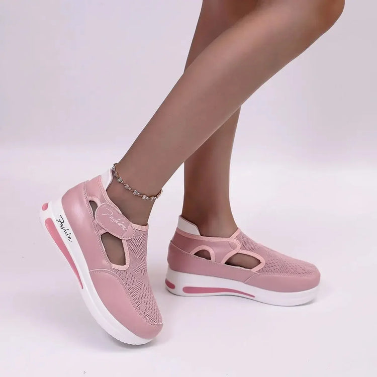 Women’s walking shoes with elevated platform sole and breathable mesh material