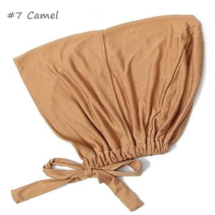 Soft elastic modal underscarf in beige, providing comfortable fit under hijabs for Muslim women