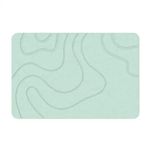Absorbent stone bath mat with diatom mud material