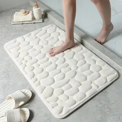 Super absorbent bath mat with cobblestone design