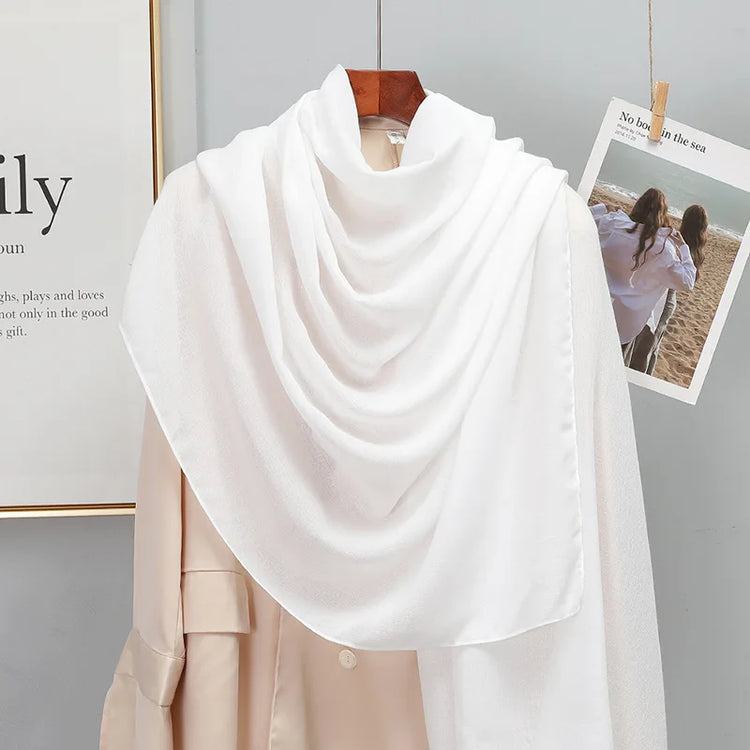 Elegant striped shawl wrap with tassel ends, suitable for casual and formal wear