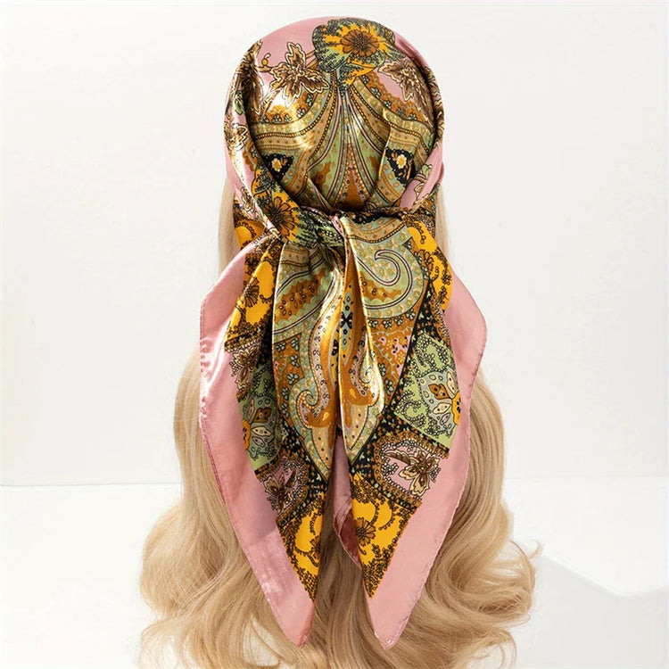 Elegant paisley print scarf styled as a fashionable necktie or handbag accessory