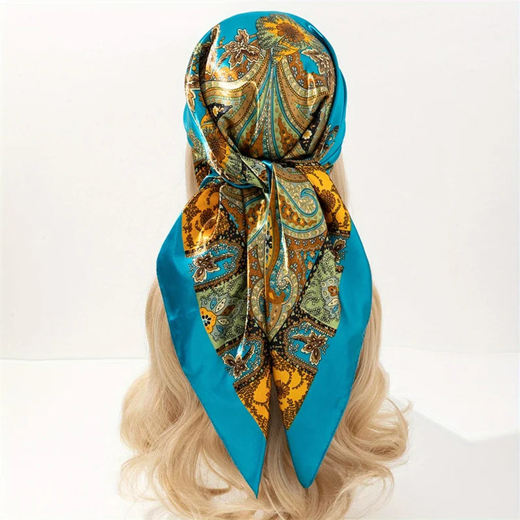 Elegant paisley print scarf styled as a fashionable necktie or handbag accessory