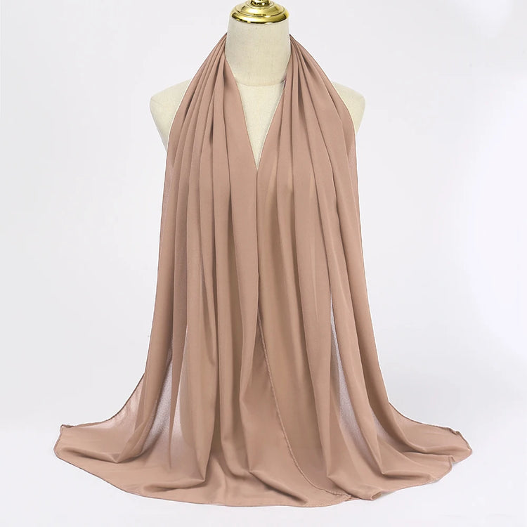Lightweight voile headscarf in soft pastel tones, ideal for Muslim women&