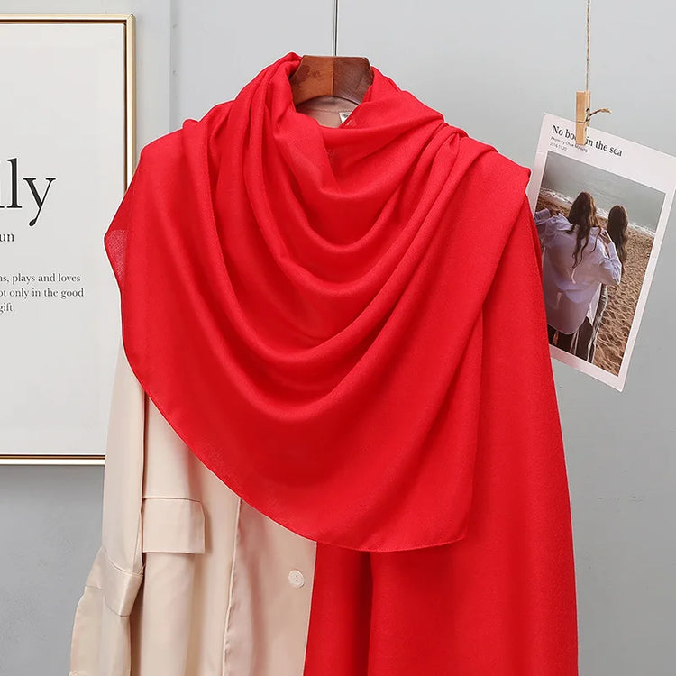 Elegant striped shawl wrap with tassel ends, suitable for casual and formal wear