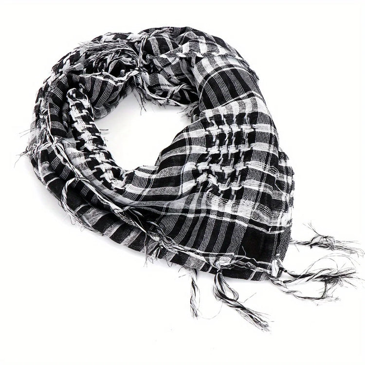 Arab shemagh scarf with traditional houndstooth pattern, styled as a face and neck wrap for sun protection