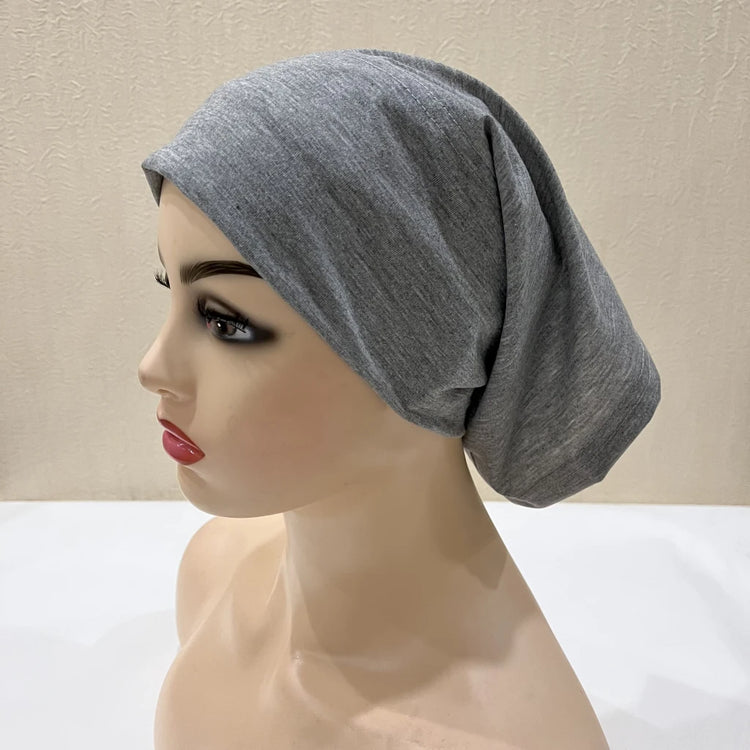 Lightweight spandex turban bonnet in beige, styled under a chiffon hijab