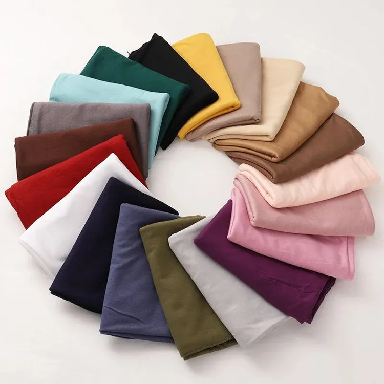 Soft plain cotton headscarf for women, used as a hijab or stylish headband wrap