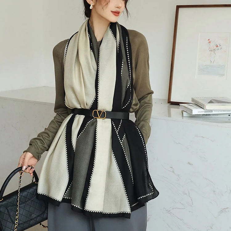 Elegant striped shawl wrap with tassel ends, suitable for casual and formal wear