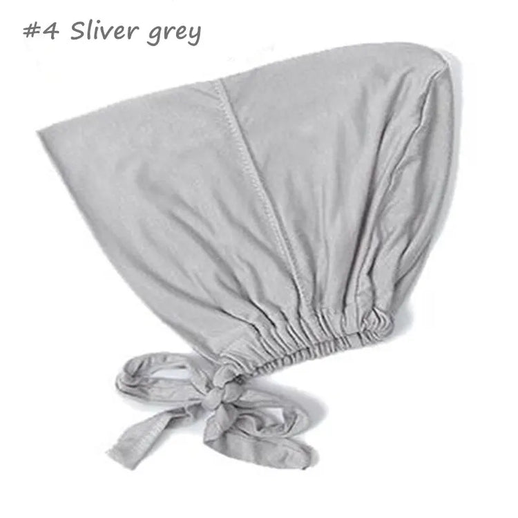 Soft elastic modal underscarf in beige, providing comfortable fit under hijabs for Muslim women