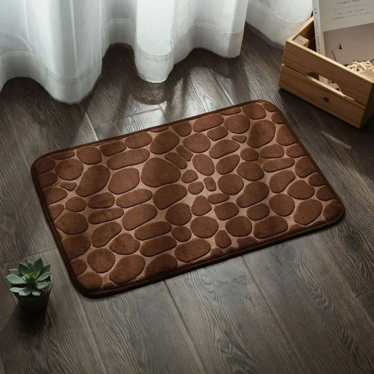 Super absorbent bath mat with cobblestone design