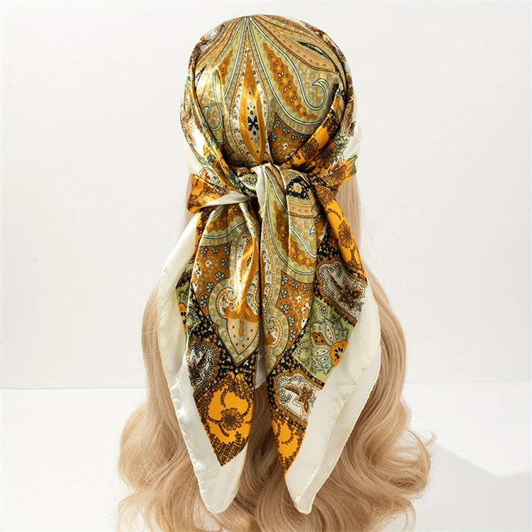 Elegant paisley print scarf styled as a fashionable necktie or handbag accessory