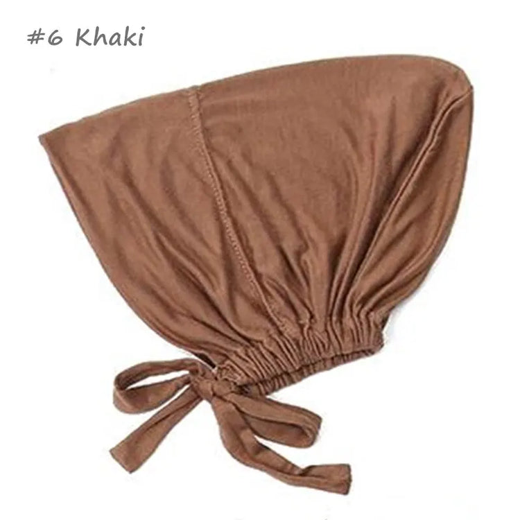 Soft elastic modal underscarf in beige, providing comfortable fit under hijabs for Muslim women