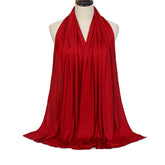 Long Muslim shawl made of modal cotton jersey fabric, wrapped elegantly around the head and ne