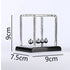 Science-themed home decor with mini Newton balance balls