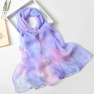 Elegant floral silk scarf by RUNMEIFA, used as a summer headscarf or body wrap